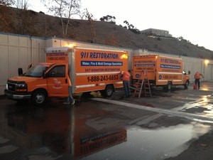 911 Restoration Trucks at Job Location