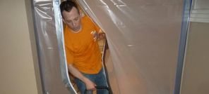 Water Damage Benbrook Technician Using Air Mover Near Vapor Barrier